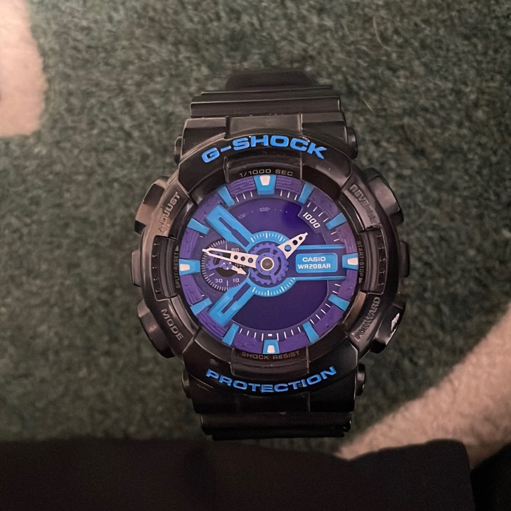 Black blue and purple g-shock watch